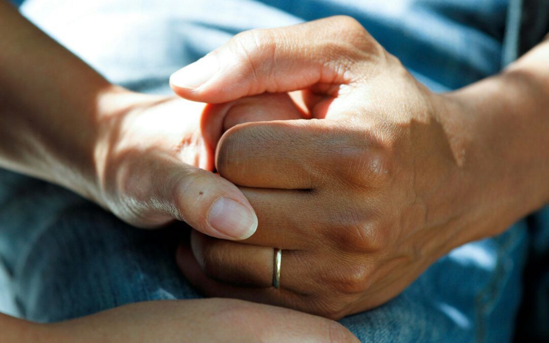 Holding Hands Supportive and Warm.