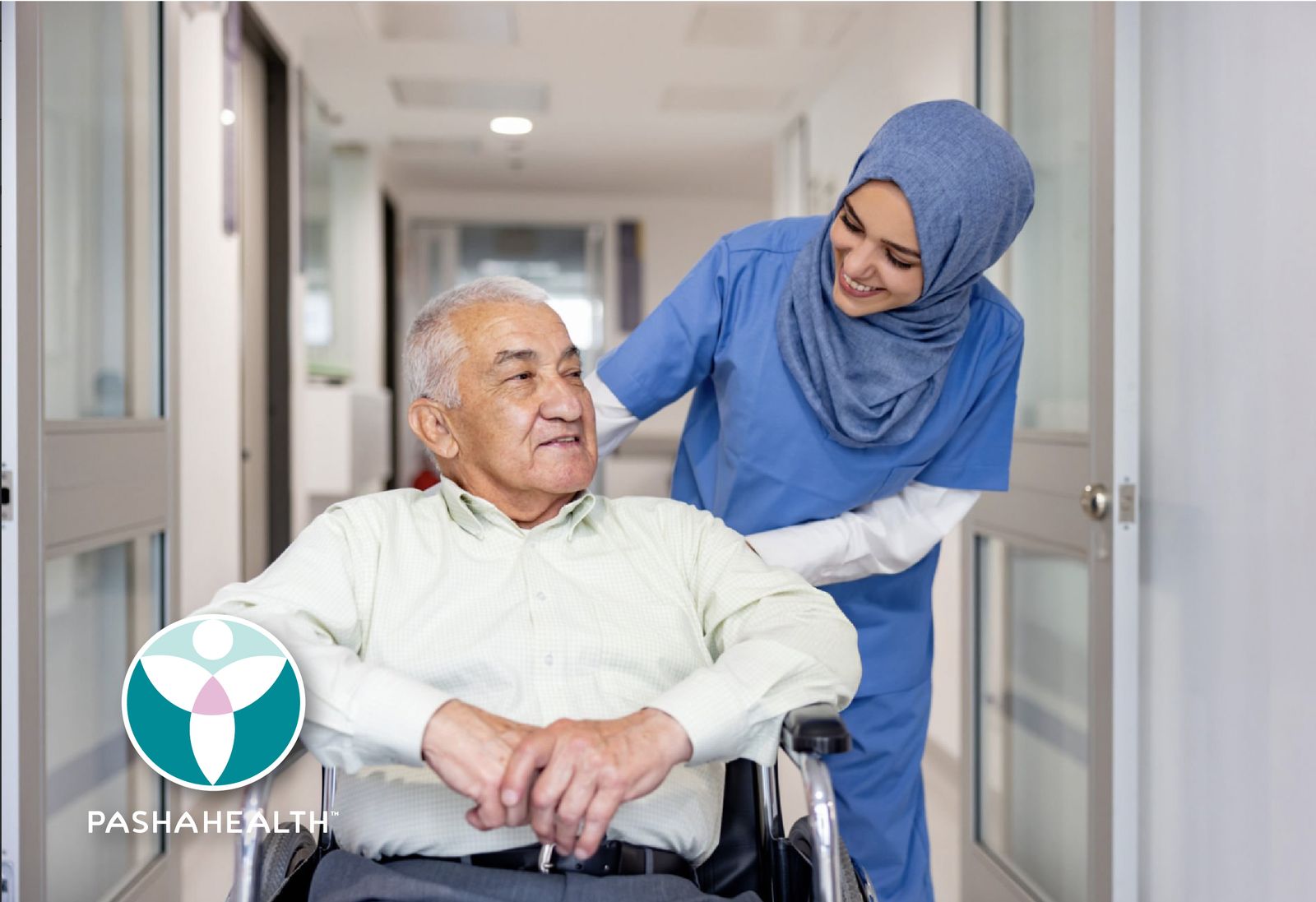 An elderly man and a Pasha Health care provider speaking with each other