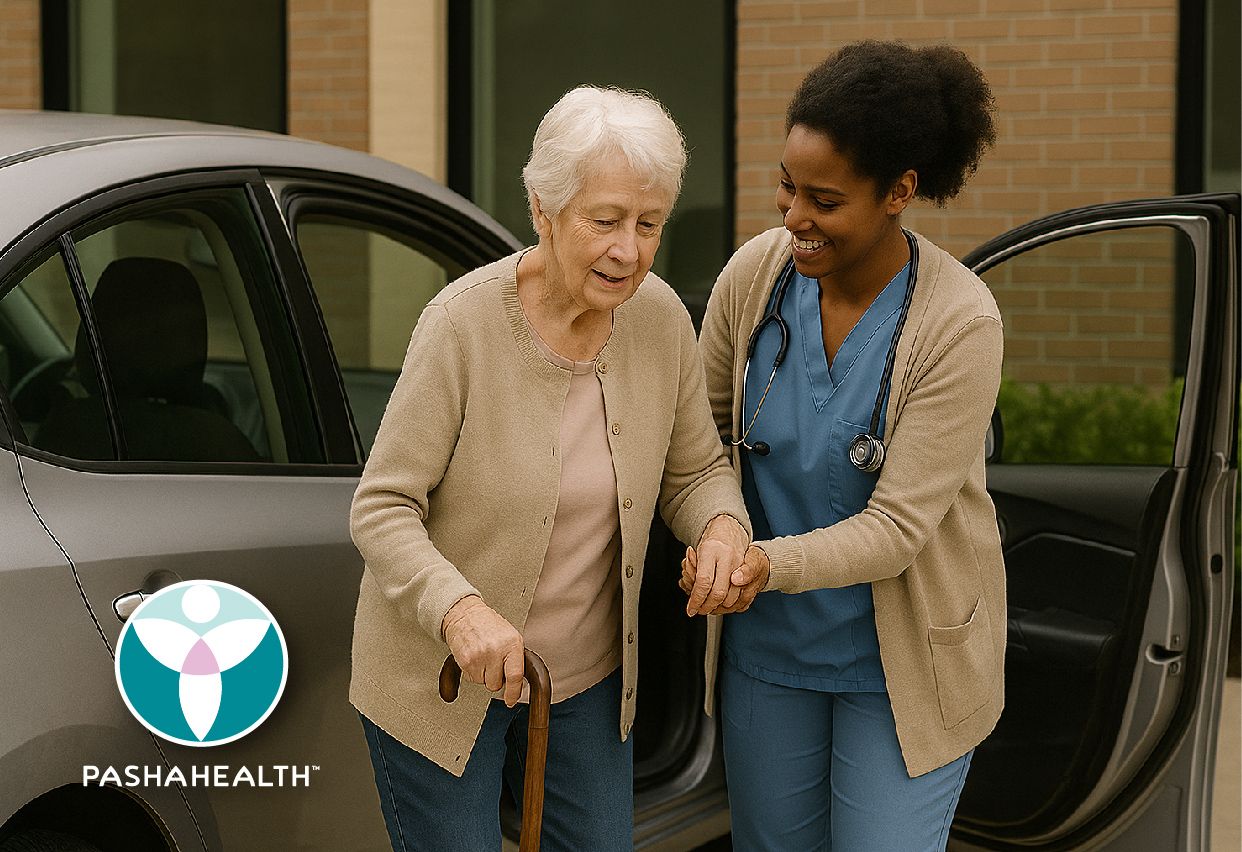 Pasha Health care provider helping a senior client out of the car